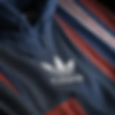 Textural Excellence of the Adidas Tricolor Hoodie Close-up of the fabric texture and design details of the Adidas Tricolor Hoodie
