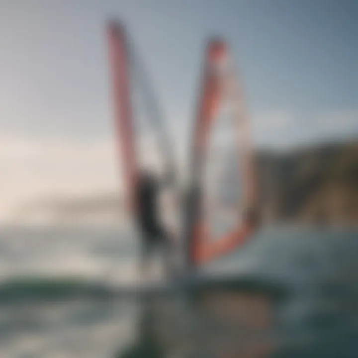 Instructor guiding a novice windsurfer on the water