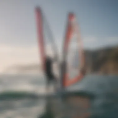 Expert Instruction for Beginner Windurfers Instructor guiding a novice windsurfer on the water
