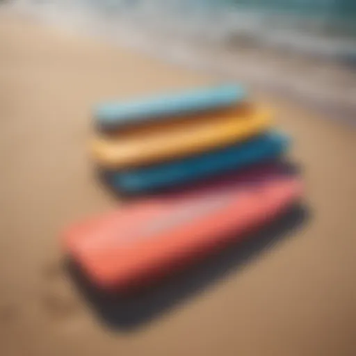 Colorful foam body boards arranged on a sandy beach