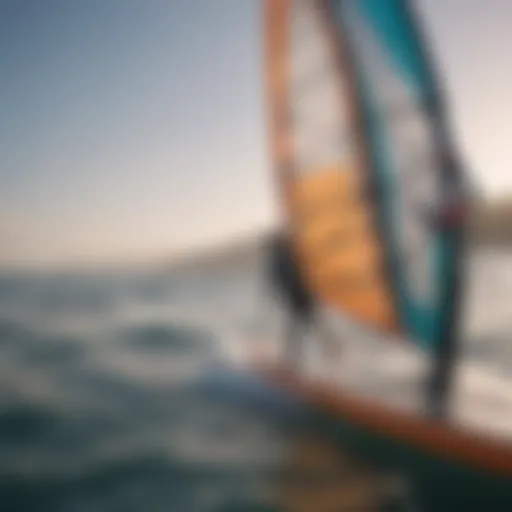 Detailed view of windsurfing board and sail