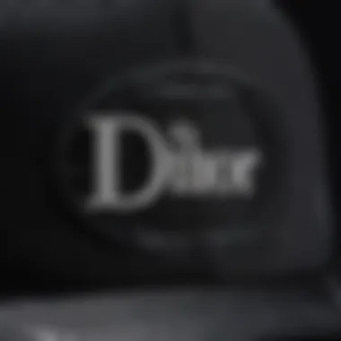 Close-up of the Dior logo embroidered on the trucker hat, highlighting the craftsmanship and branding.