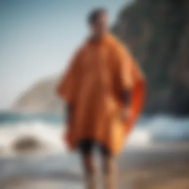 User wearing a surf poncho after a swim, enjoying the sun