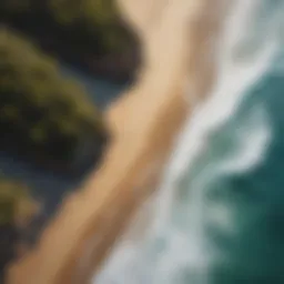 A stunning aerial view of a remote beach with perfect waves