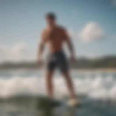 Active individual wearing Billabong shorts during a surf session