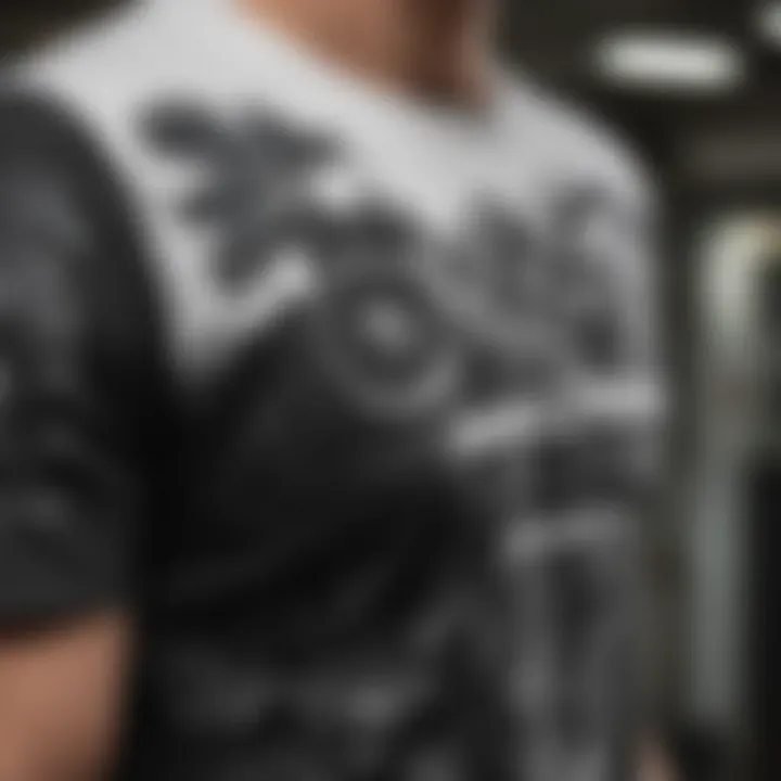 Close-up of a black and white graphic tee with extreme sports motifs