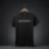 A classic black t-shirt displayed against a minimalist backdrop, showcasing its timeless appeal.
