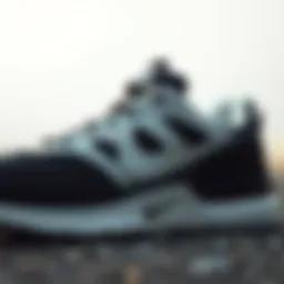 Close-up view of black and white Nike workout shoe showcasing intricate design details