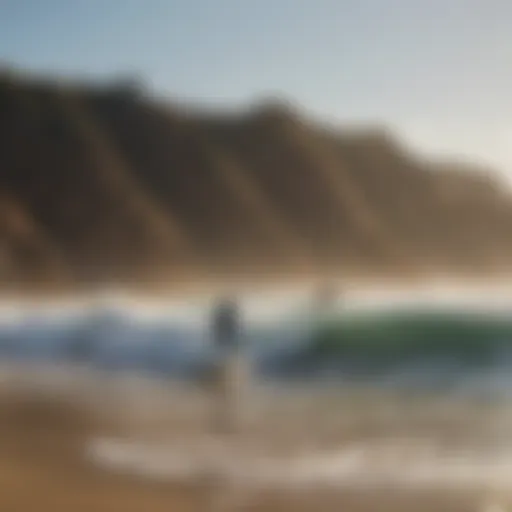 A stunning view of surfers riding the waves at Malibu Beach.