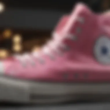 Close-up of Chuck Taylor All Star Pink High Tops highlighting their design details