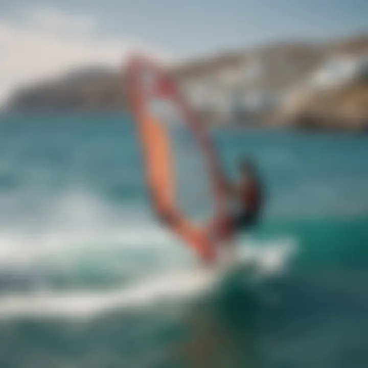 A stunning coastline of Mykonos with a windsurfer gliding smoothly over the waves.