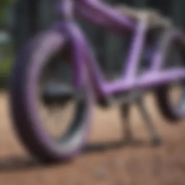BMX bike featuring custom purple grip tape with unique art.