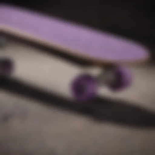 Skateboard with purple grip tape showcasing its texture and design.