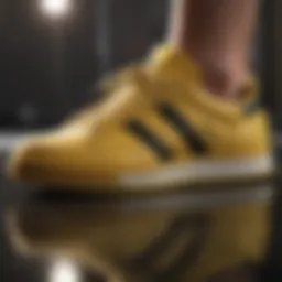Close-up view of Adidas yellow shoes showcasing their innovative design.