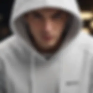Detailed Design: The Aesthetic Appeal of Hoodies Close-up of a hoodie with white strings, emphasizing its intricate design and material quality.