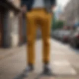 Stylish mustard pants paired with a casual shirt and sneakers.