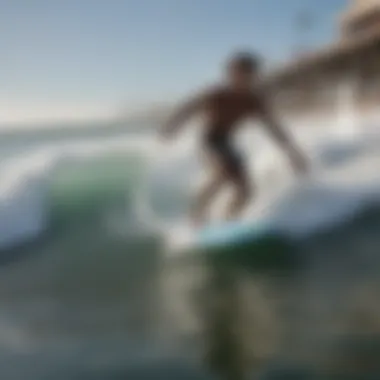 Surfer riding a wave at Huntington Beach