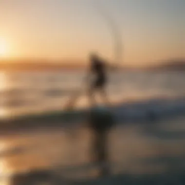 A kite paddle surfer gliding across the water at sunset