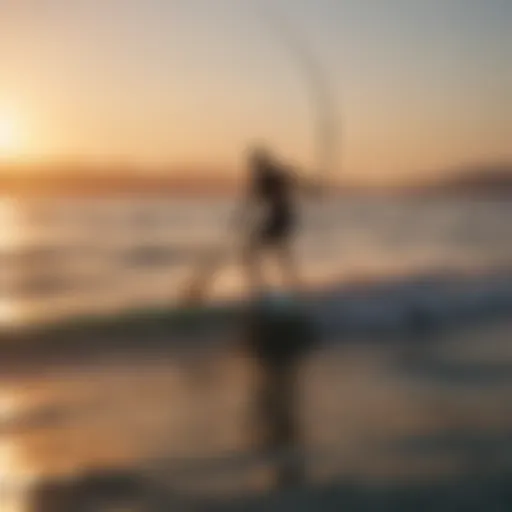 A kite paddle surfer gliding across the water at sunset