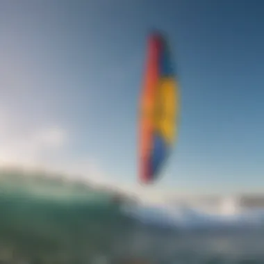 A vibrant kite soaring high above the ocean