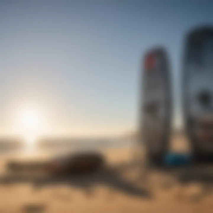 An array of kiteboarding gear including kites, boards, and harnesses displayed on a sunny beach