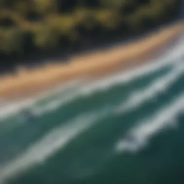 An aerial view of a group practicing moto surf techniques on the water.