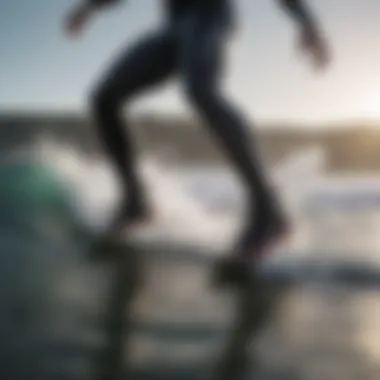 Surfer wearing Rip Curl surf booties on a wave