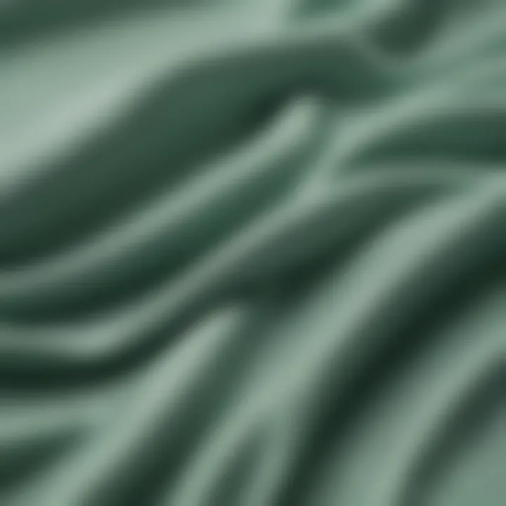 A close-up of seafoam green fabric, highlighting its texture and quality, ideal for fashion enthusiasts.