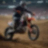 Exciting moment during the Supercross race in Atlanta, showcasing intense competition on the track.