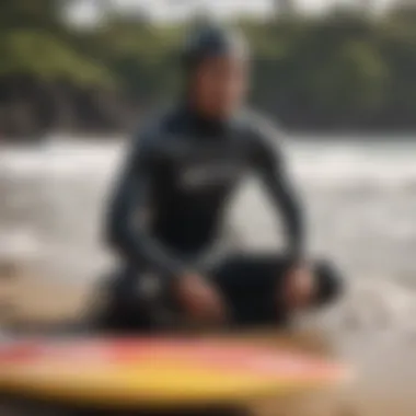 Surfers preparing their gear on the sandy shores of Hilo