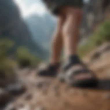 Adventurer wearing tech sandals on rugged terrain