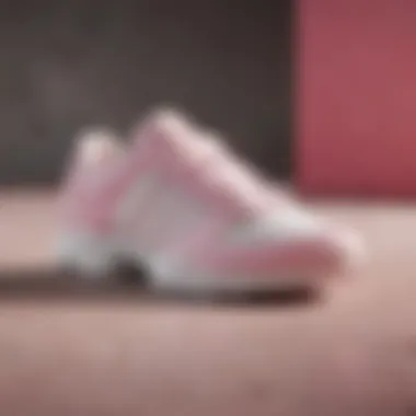 Branding Strategies: adidas Marketing with White and Pink Theme A creative display of adidas marketing materials featuring the white and pink theme, illustrating branding strategies.