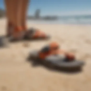 Stylish Reef sandals displayed on a sandy beach