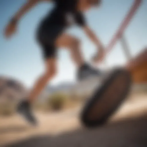 Dynamic action shot of an athlete wearing black leopard print Vans during an extreme sport event.