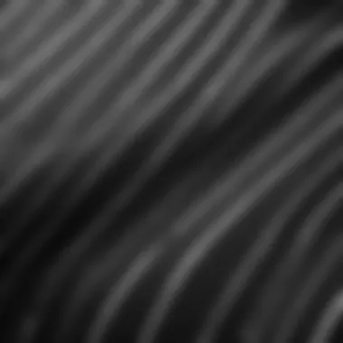 Close-up of the fabric and texture of a black and white striped shirt.