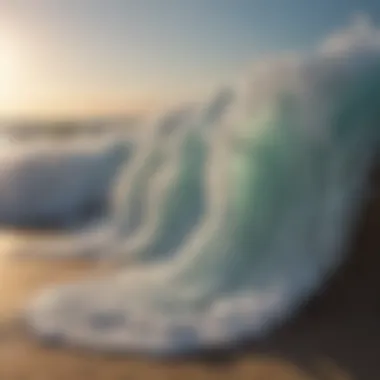 Close-up of sea foam on the beach with sunlight