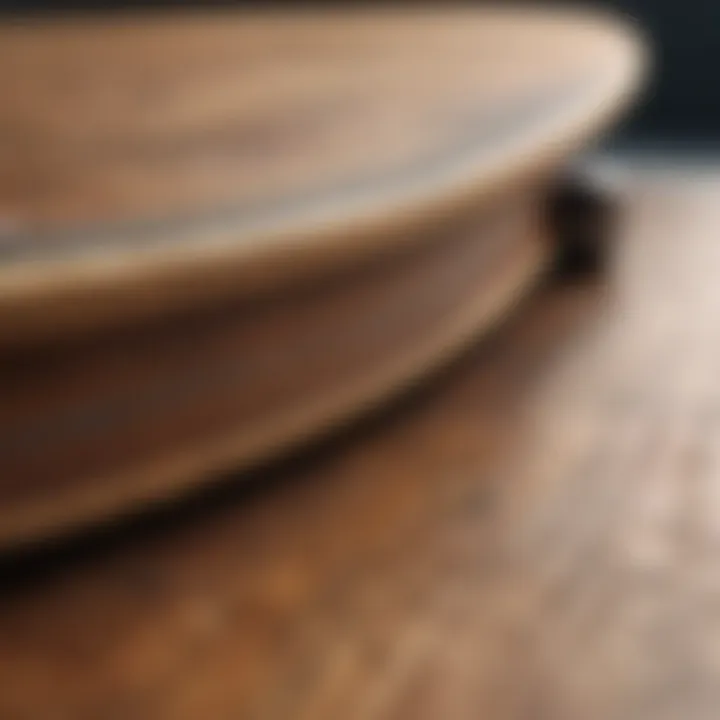 Close-up view of skateboard deck materials highlighting wood and fiberglass