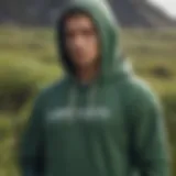 Stylish green Billabong hoodie showcased on a scenic outdoor background