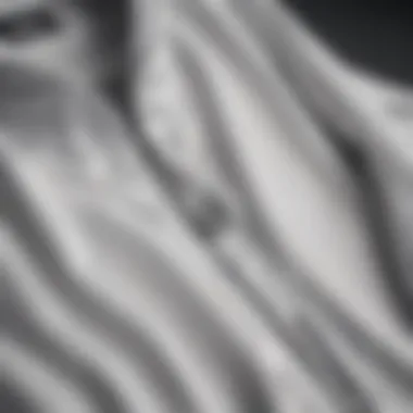 Design Excellence: Unpacking the Aesthetics of White Vans Windbreakers Close-up view of the design details of a white Vans windbreaker