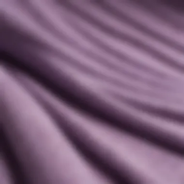 Close-up of the fabric texture of a lavender hoodie, showcasing its quality.