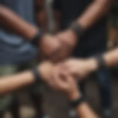 Group of friends sharing moments while wearing black love bracelets, illustrating connection and unity.