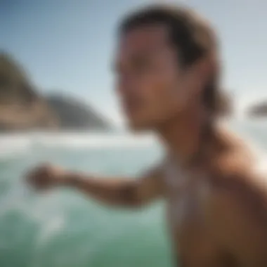 A surfer hydrating with water after an intense session, illustrating the importance of hydration.