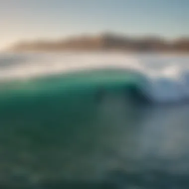 An aerial shot highlighting the diverse surf spots along the Todos Santos coastline, capturing surfers riding the waves.