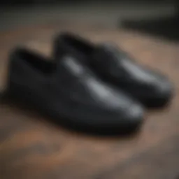 Close-up of Vans black boat shoes showcasing their unique design features.